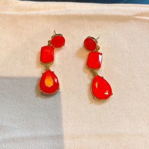 Orange drop statement earrings.
